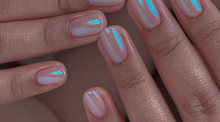 Iridescent nails at Niko Nail Studio, La Verne, California, US. Perfectly manicured with a pearly shine.