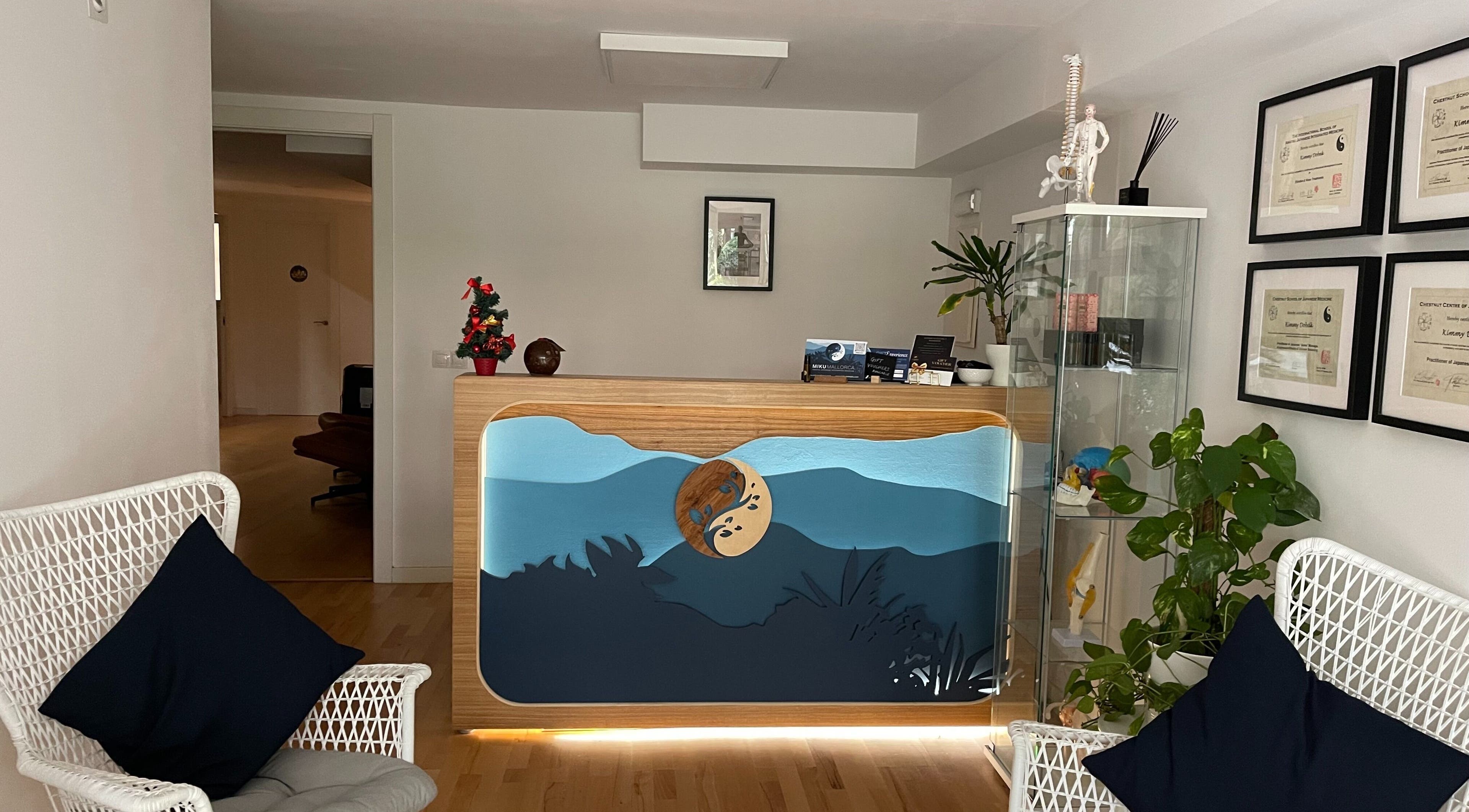 Reception area of Kobido Mallorca in Palma, Illes Balears, ES, featuring elegant seating and decor.