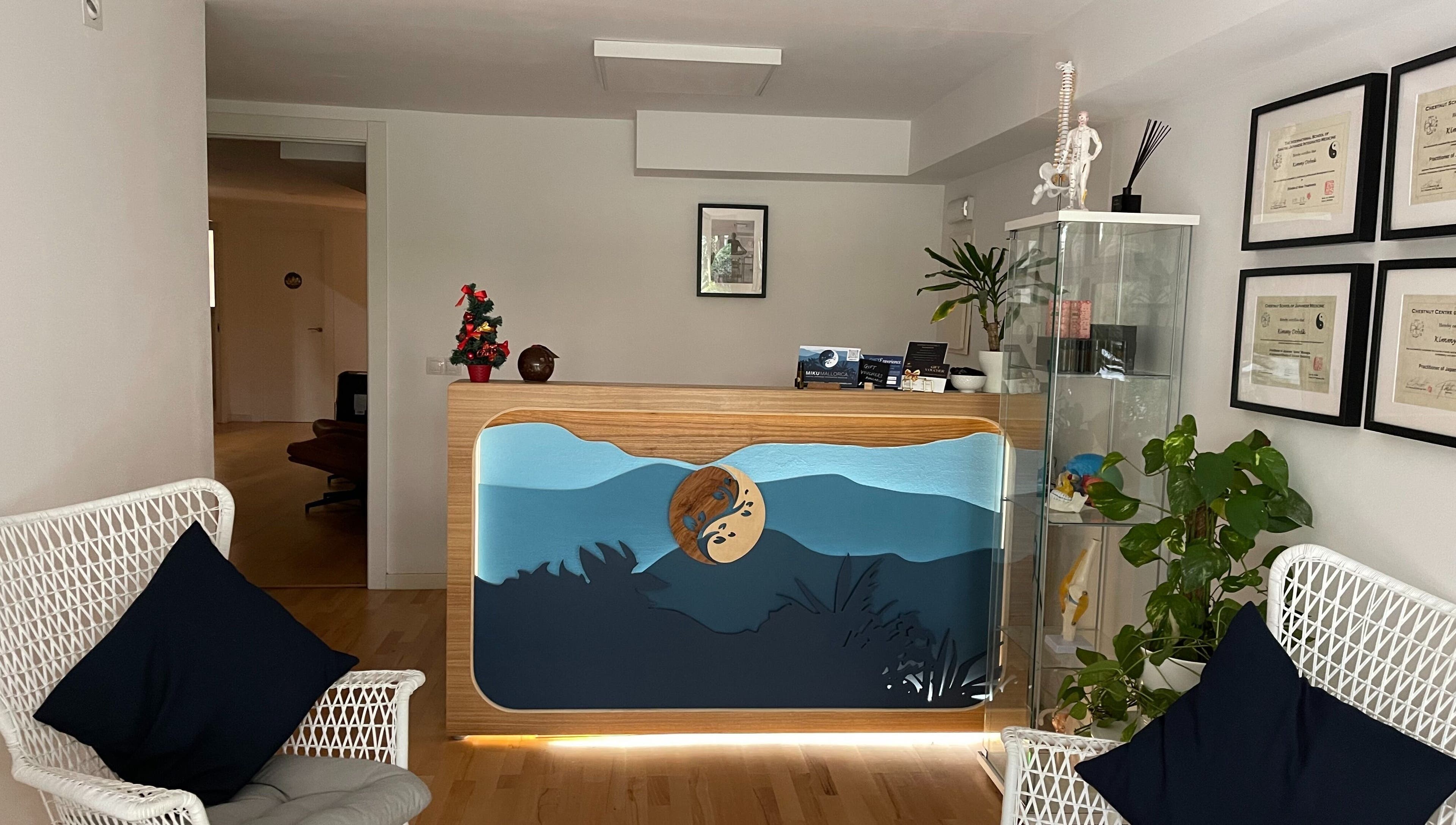 Reception area at Kobido Mallorca in Palma, Illes Balears, ES with seating and decorative details.