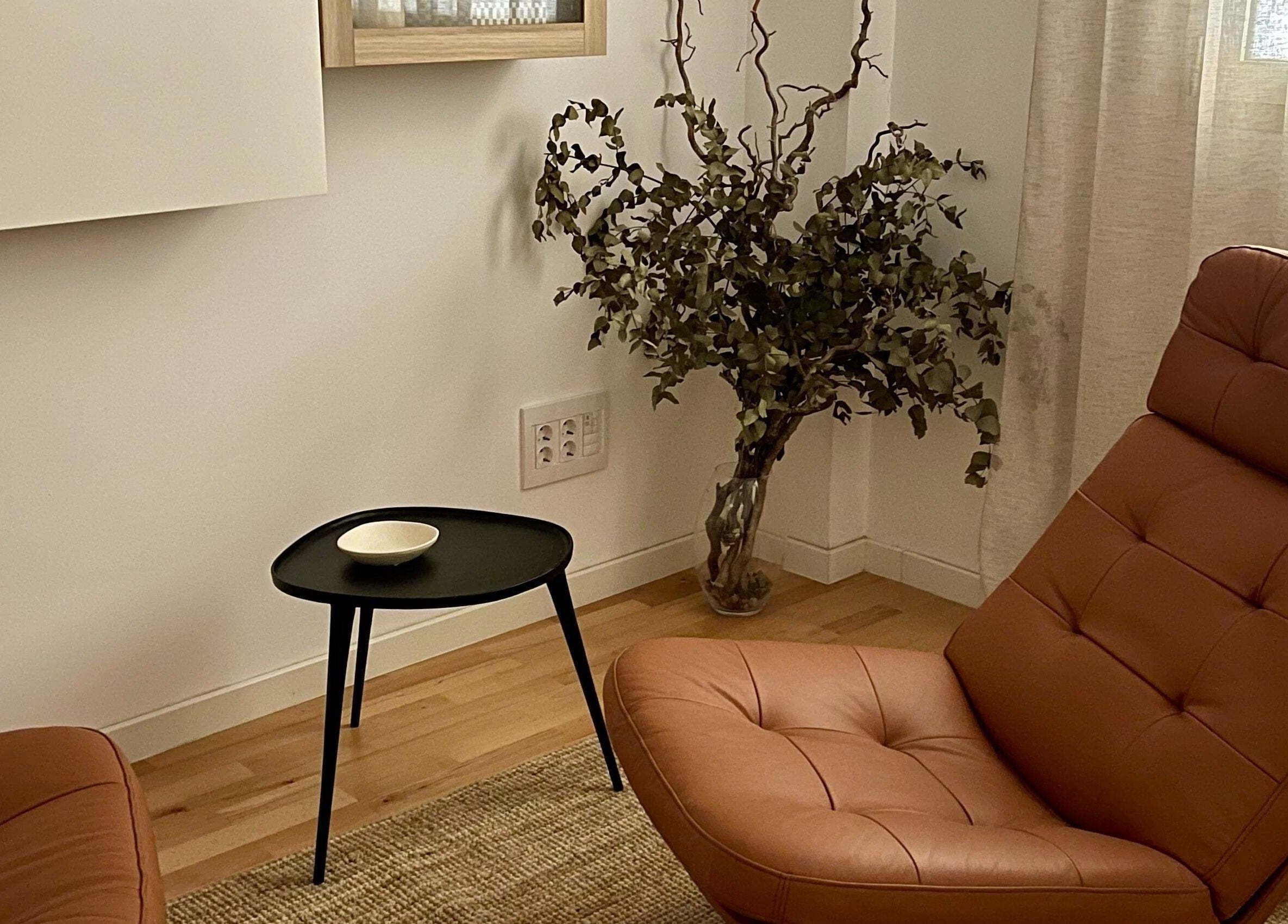 Relaxing brown leather chair and table at Kobido Mallorca, Palma, Illes Balears, ES enhancing serene ambiance.