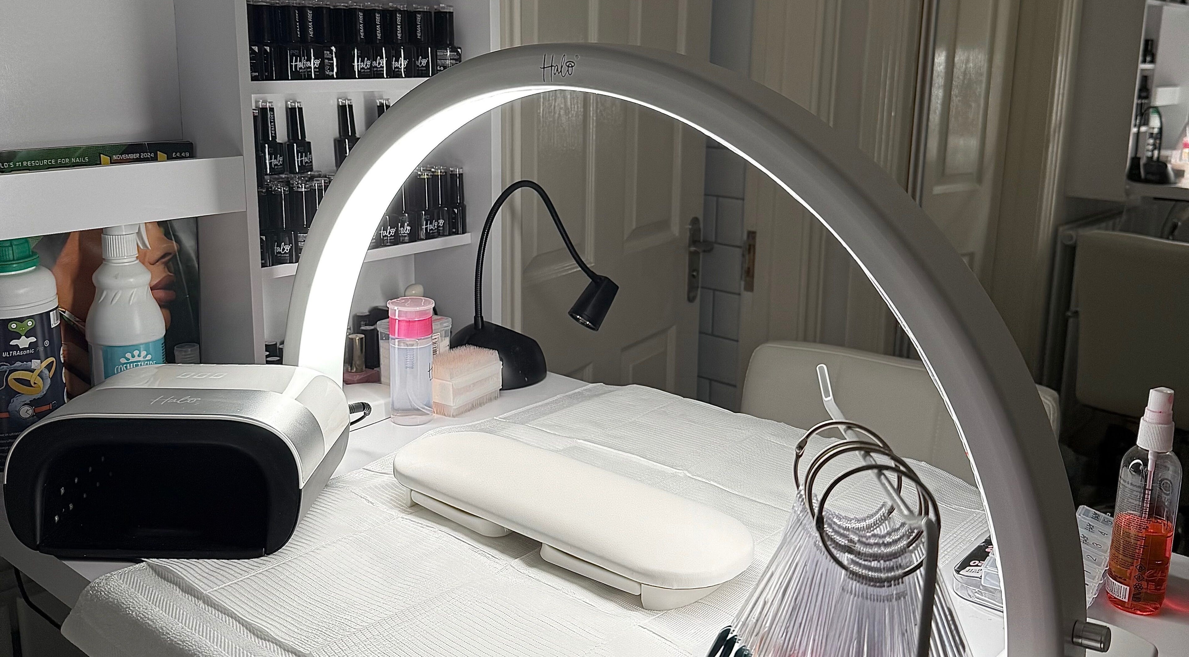 Nail station setup at Bare by Jus in Sittingbourne, England, GB with professional tools and lighting.