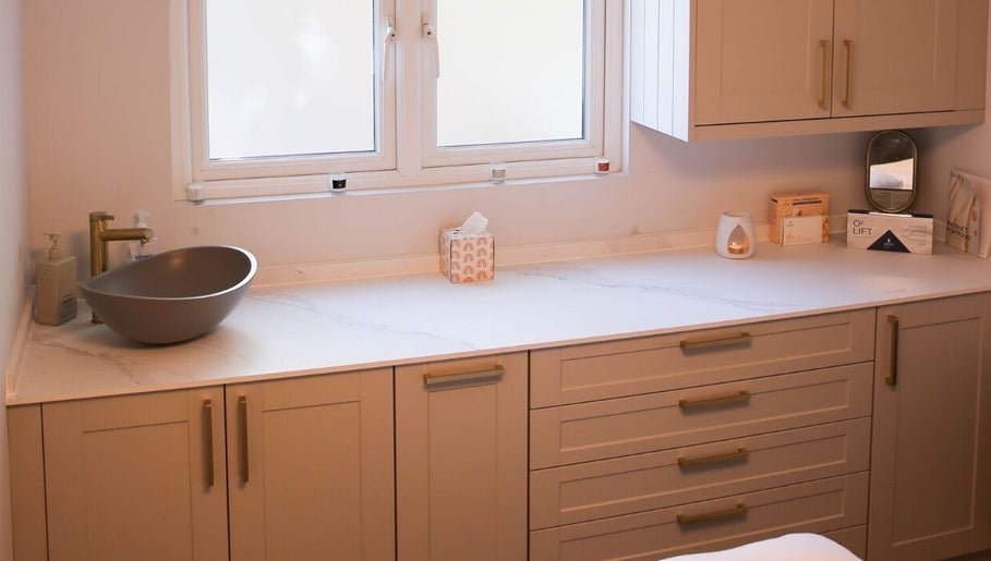 Modern countertop with stylish sink at Revitalizetherapies, Carlton Colville, England, GB.