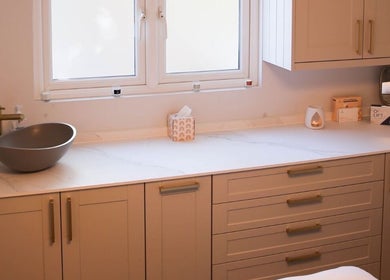 Modern countertop with stylish sink at Revitalizetherapies, Carlton Colville, England, GB.