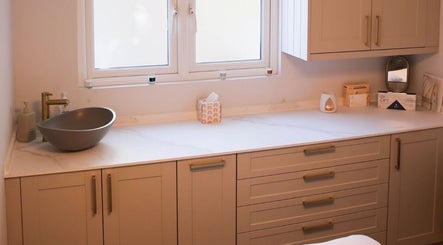 Modern countertop with stylish sink at Revitalizetherapies, Carlton Colville, England, GB.