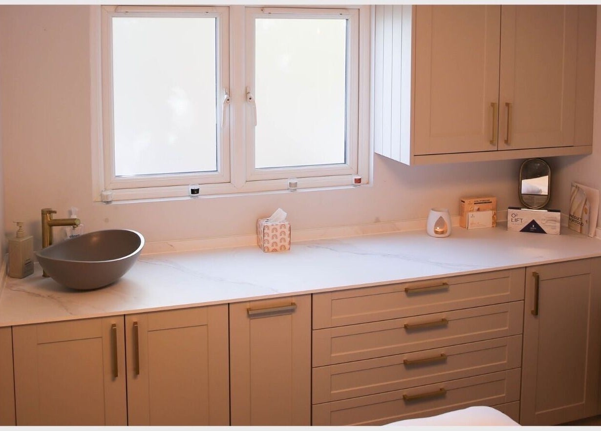 Elegant spa counter at Revitalizetherapies, Carlton Colville, England, GB, with basin and soothing decor.
