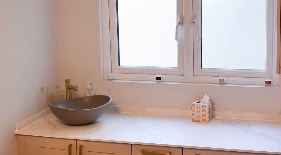 Modern washbasin at Revitalizetherapies, Carlton Colville, England, GB, enhancing a serene atmosphere.