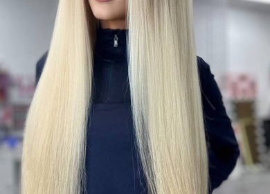 Sleek blonde hair at Studio Queen Hair, Sherman Oaks, California, US.
