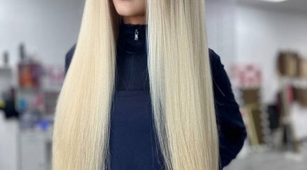 Sleek blonde hair at Studio Queen Hair, Sherman Oaks, California, US.