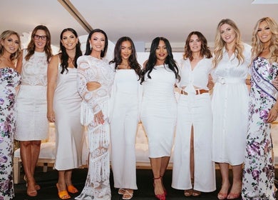 Group of women in elegant attire at Studio Queen Hair, Sherman Oaks, California, US.
