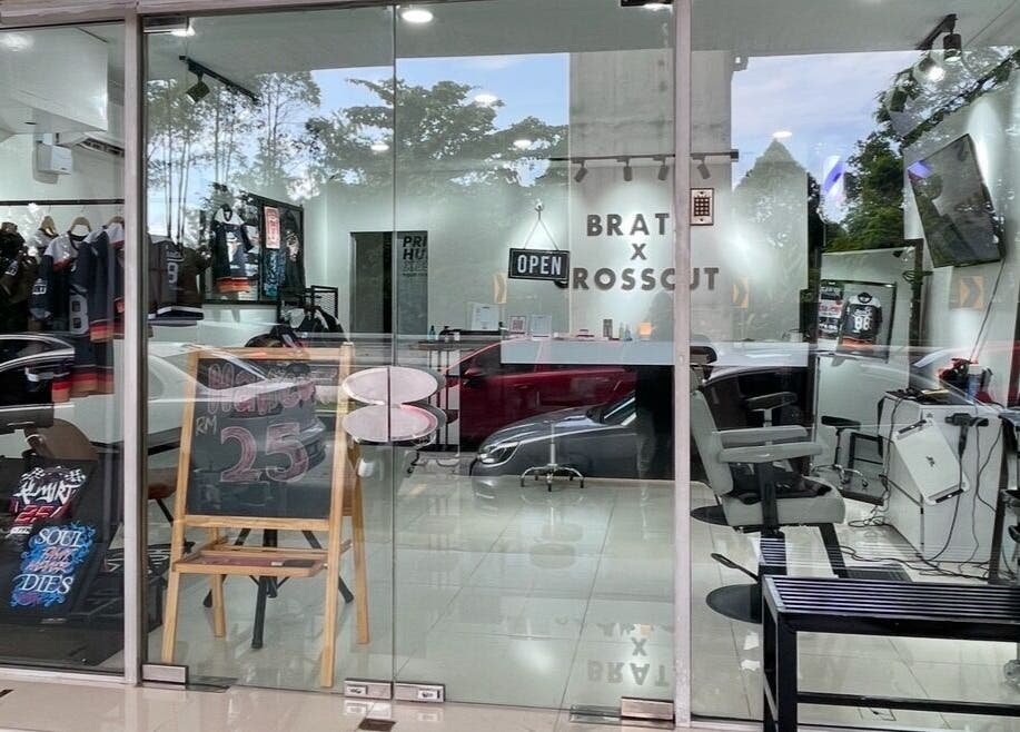 Chic interior of CROSSCUT BARBERS at Kuala Lumpur, Wilayah Persekutuan Kuala Lumpur, MY with stylish decor.