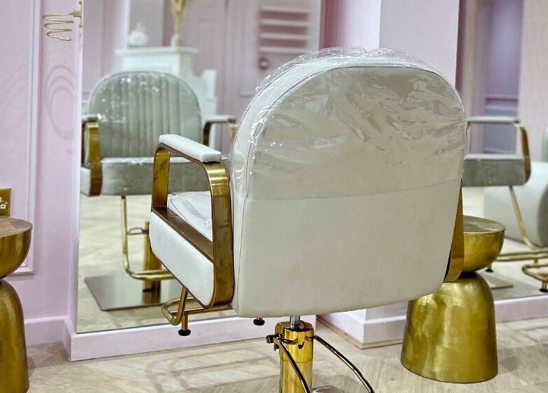 Chic salon chair and decor at Nailsbyklc in Monton, England, GB, highlight modern elegance in beauty services.