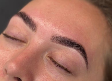 Close-up of expertly shaped eyebrows at Defined by Amy Jane, Altrincham, England, GB.