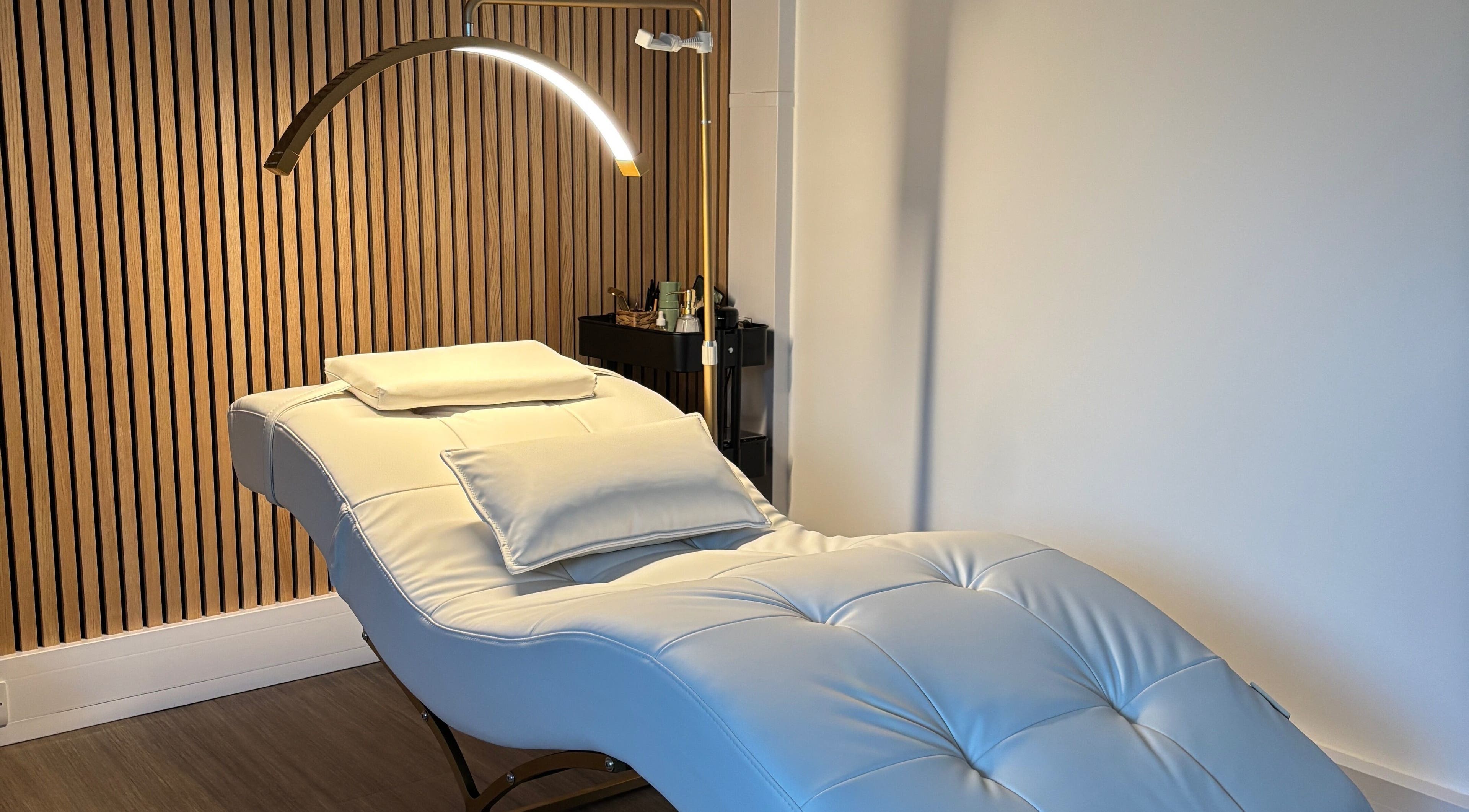 Relax in style at Defined by Amy Jane, Altrincham, England, GB. Sleek spa lounge and calming ambiance.