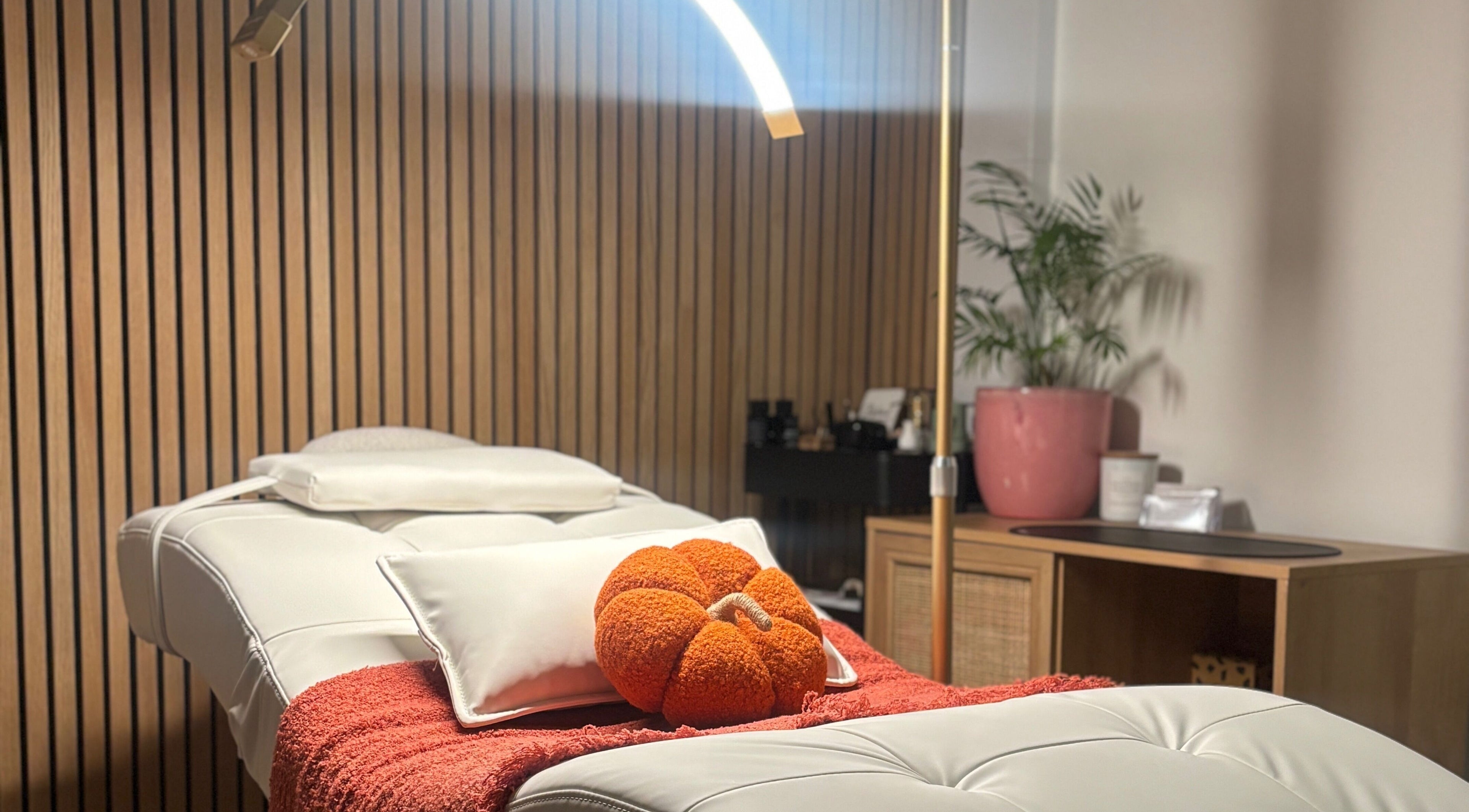 Modern treatment room at Defined by Amy Jane, Altrincham, England, GB, showcasing tranquil decor and comfort.