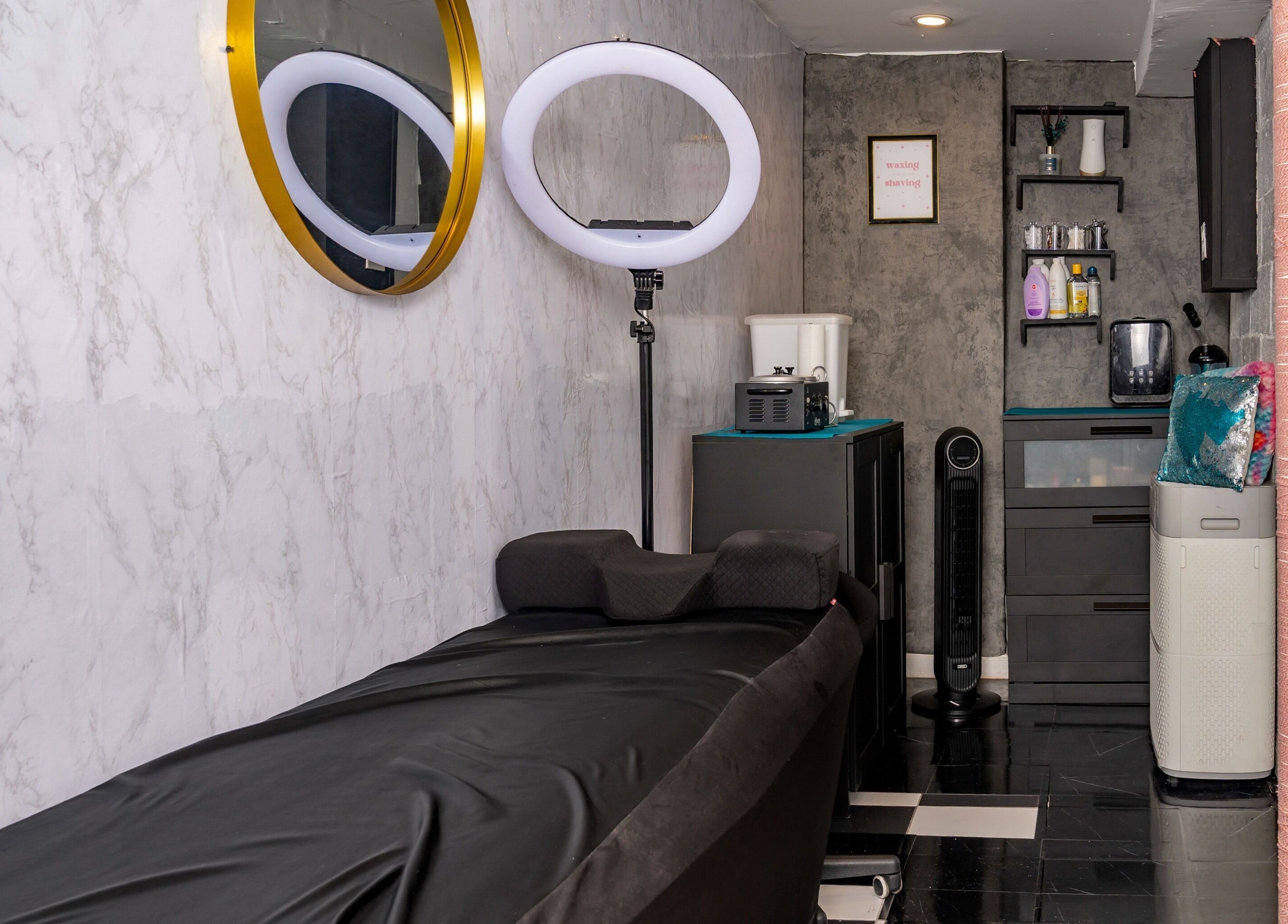 Elegant beauty room at Pick A Color Studio in New York, New York, US, featuring sleek decor and modern amenities.