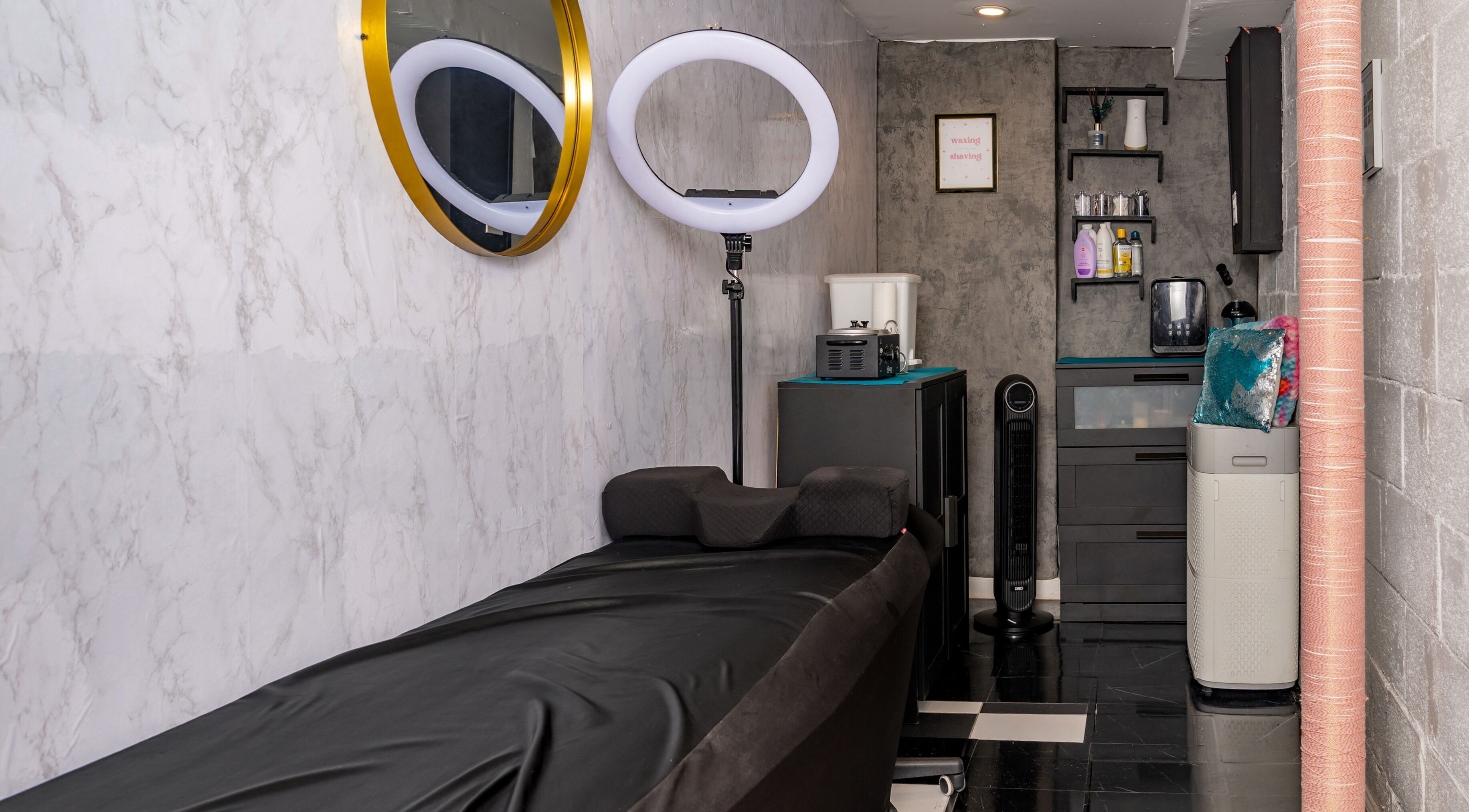Elegant beauty room at Pick A Color Studio in New York, New York, US, featuring sleek decor and modern amenities.