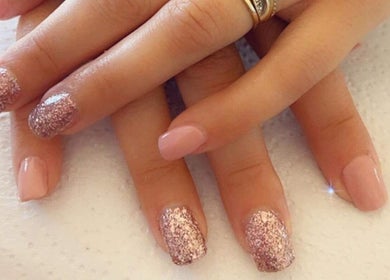 Elegant glittery manicure at Lady Nails, Taupō, Waikato, NZ, showcasing sparkling nail art design.