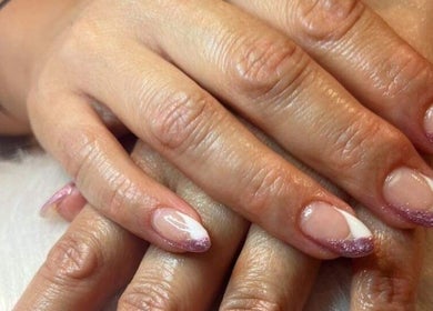 French manicure with pink glitter at Lady Nails, Taupō, Waikato, NZ. Stylish and polished nail art.