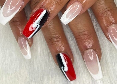Stylish red, black, and white nail art at Lady Nails, Taupō, Waikato, NZ. Perfect for a chic manicure.
