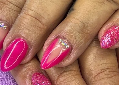 Vibrant pink nail art with rhinestones at Lady Nails, Taupō, Waikato, NZ.