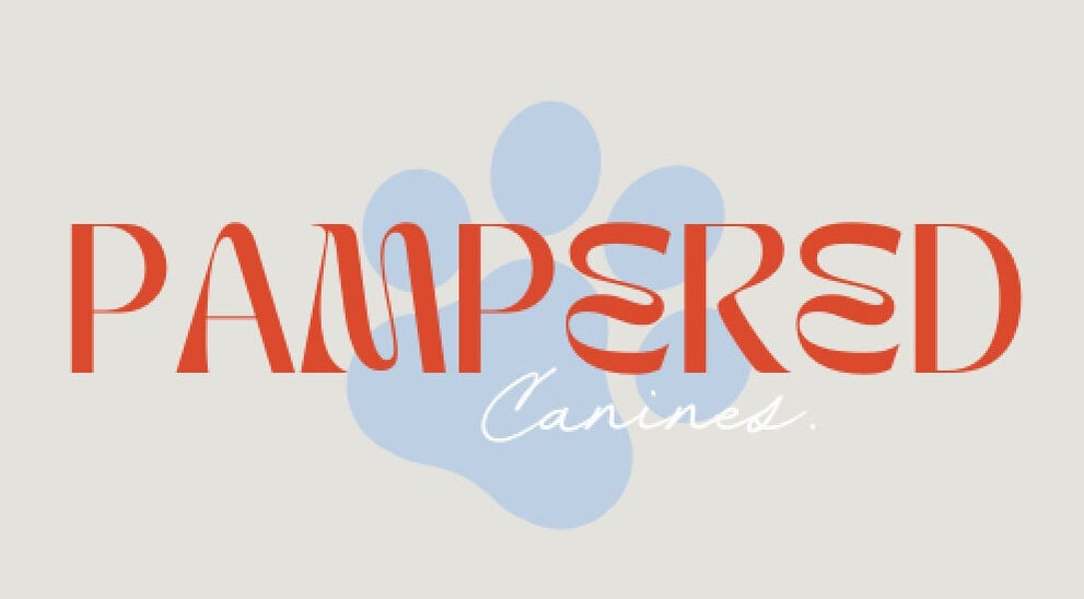 Logo of Pampered Canines at Melbourne, Victoria, AU with red text and blue paw print.