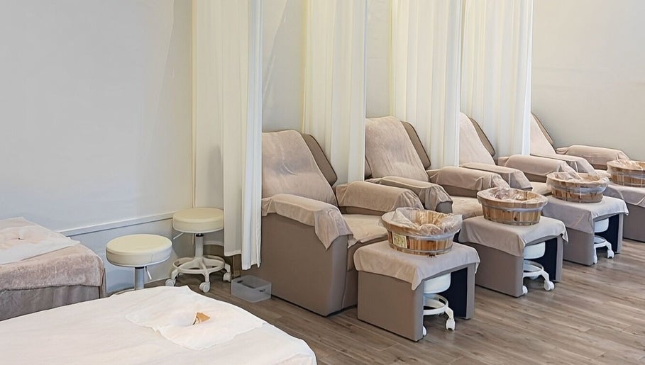 Comfortable spa chairs and foot basins lined up at Oaken, Singapore, Singapore, SG for ultimate relaxation.
