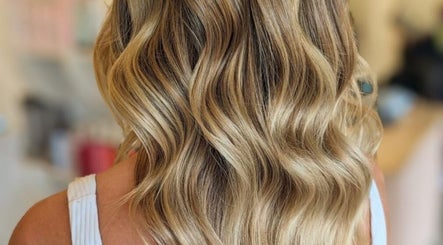 Blonde waves styled at Jessi do my hair in Dee Why, New South Wales, AU, showcasing expert hair design.