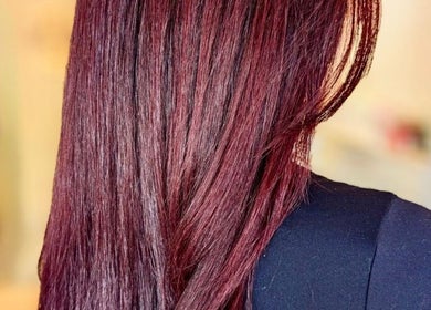 Vibrant red hair styled at Jessi Do My Hair, Dee Why, New South Wales, AU.