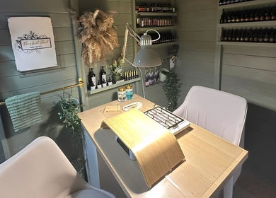Well Gel nail station with chic decor in Buckshaw Village, England, GB showcasing elegant beauty products.