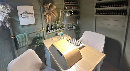 Well Gel nail station with chic decor in Buckshaw Village, England, GB showcasing elegant beauty products.