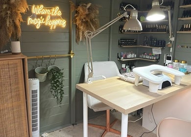 Chic nail station at Well Gel, Buckshaw Village, England, GB with warm lighting and elegant decor.