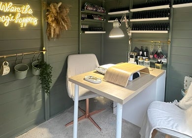 Cozy nail station at Well Gel, Buckshaw Village, England, GB, emphasizing nail care and relaxation.