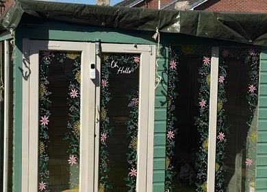 Charming floral entrance at Well Gel, Buckshaw Village, England, GB, enhancing the serene wellness ambiance.