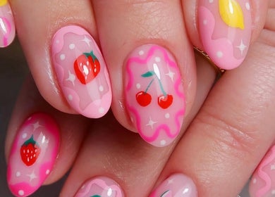 Vibrant fruit-themed nail art at Well Gel, Buckshaw Village, England, GB. Perfect for stylish beauty enthusiasts.