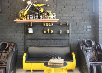 Relaxed seating and product display at Picasso Barbershop, Riyadh, Riyadh Province, SA.