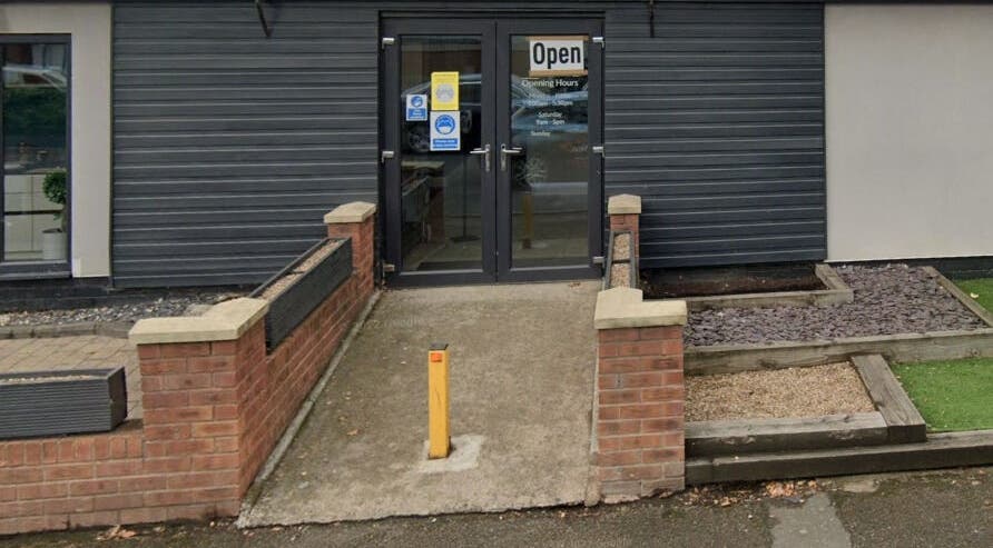 Entrance to Pampa Nail Salon & Training Academy in Rotherham, England, GB with modern facade.