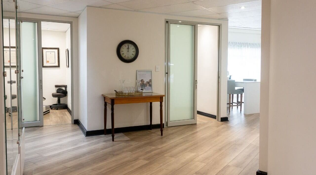 Modern interior of Man Sense Waxing Studio in Johannesburg, Gauteng, ZA with sleek wood flooring.