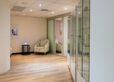 Cozy waiting area at Man Sense Waxing Studio, Johannesburg, Gauteng, ZA with comfortable chairs and ambient lighting.
