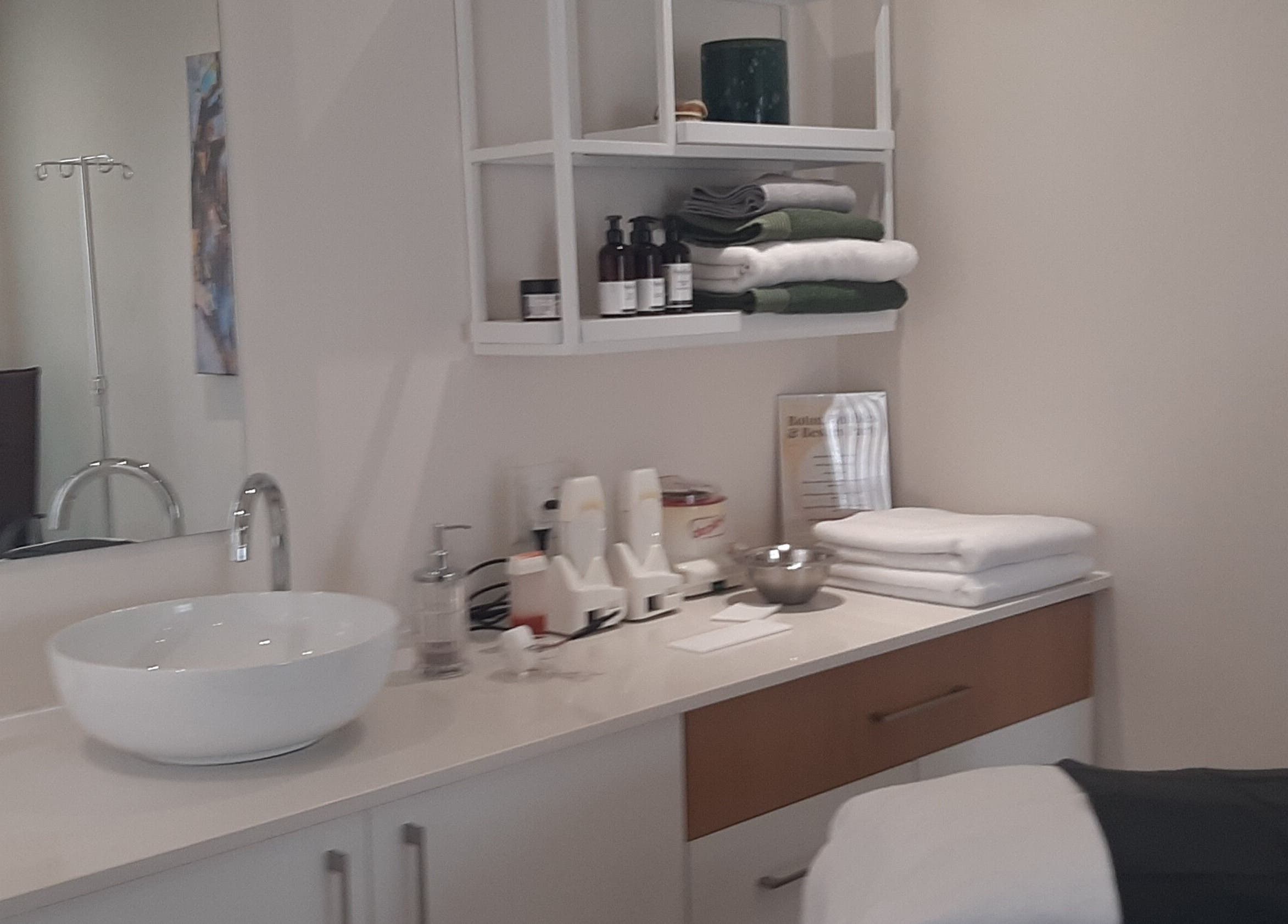 Luxurious interior of Man Sense Waxing Studio in Johannesburg, Gauteng, ZA with modern sink and towels.