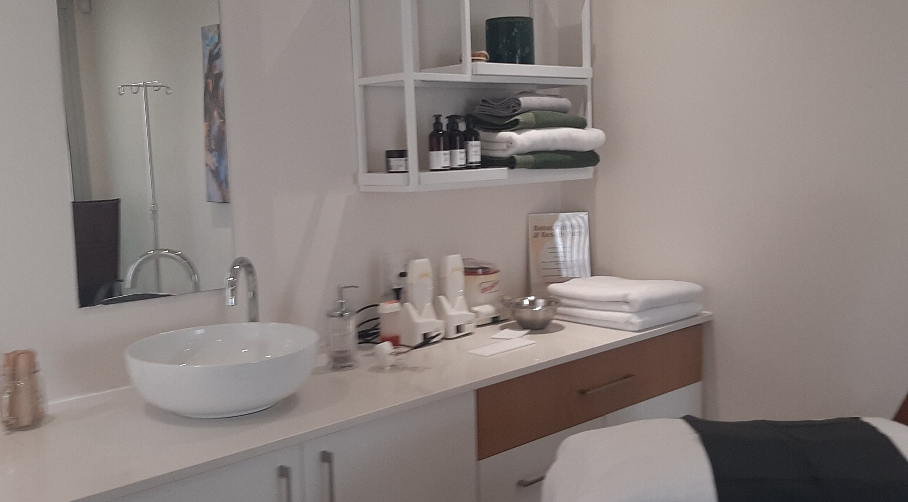 Luxurious interior of Man Sense Waxing Studio in Johannesburg, Gauteng, ZA with modern sink and towels.