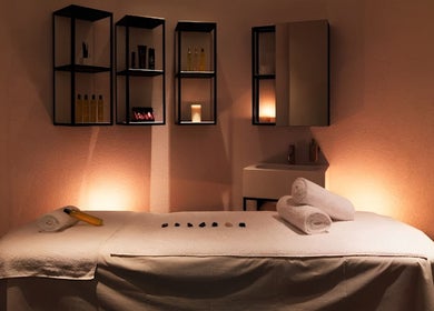 Calm therapy room at Sense Wellness Sofia, Sofia City Province, BG, with cozy lighting and massage table.