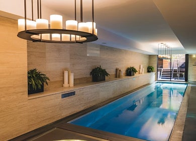 Luxurious indoor pool at Sense Wellness Sofia, Sofia City Province, BG, with elegant decor and ambient lighting.