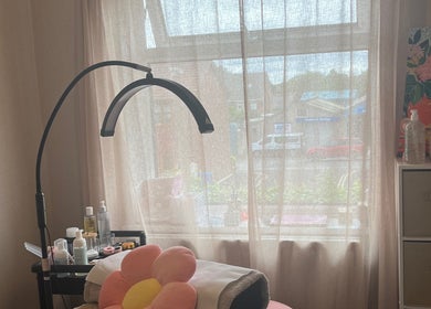 Cozy treatment room at Brows: By Hazel Bromiley in Chorley, England, GB, featuring modern decor and soft lighting.