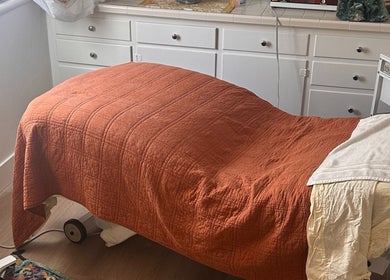 Relaxing treatment room at Donna Cherie Aesthetics, Santa Cruz, California, US with an inviting massage table.