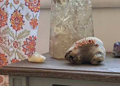 Relaxing decor at Donna Cherie Aesthetics, Santa Cruz, California, US. Features crystals and floral patterns.