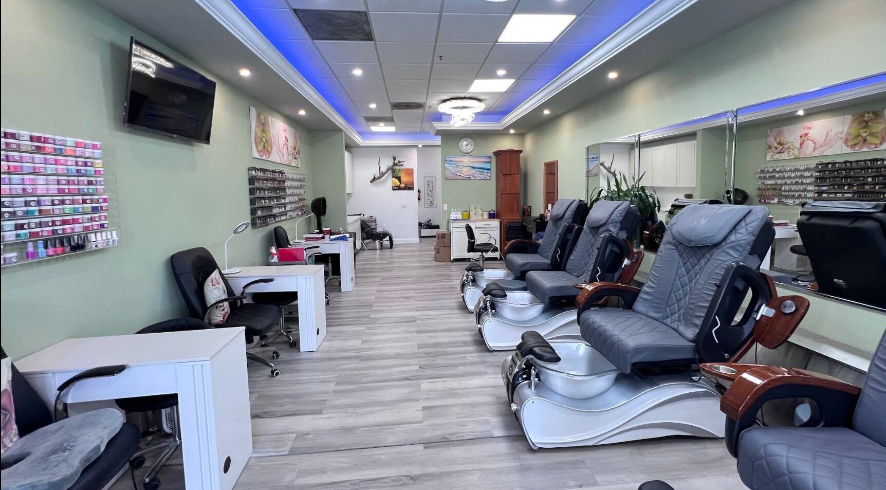 Modern interior of Healthy Nails in Laguna Niguel, California, US, showcasing spacious pedicure seating.