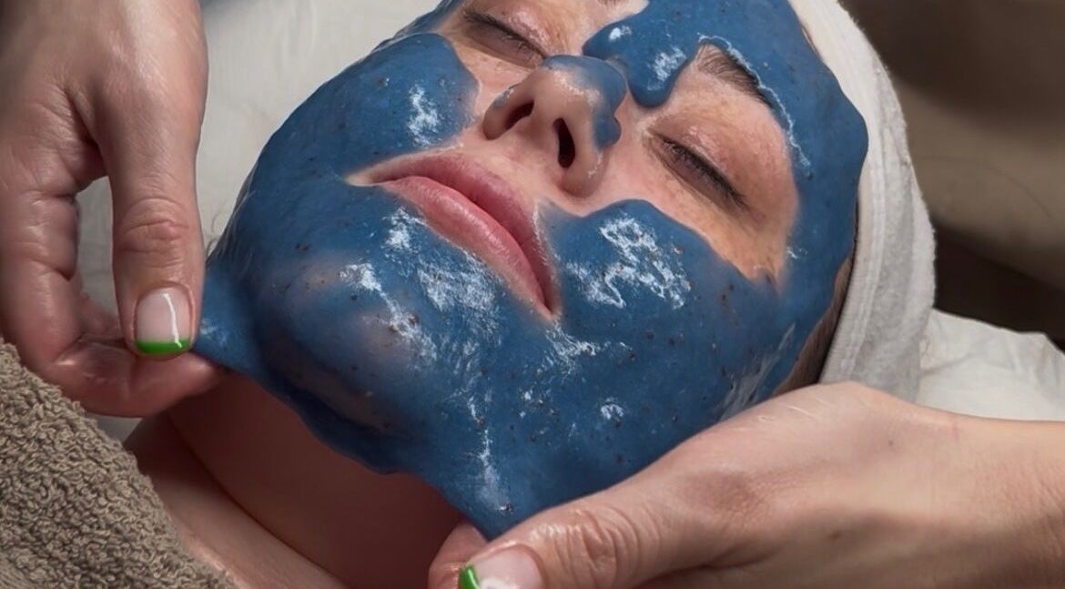 Rejuvenating facial treatment with blue mask at Skin Luxe Studio, Fleur-de-lis, Wales, GB.