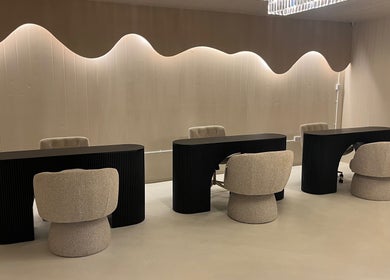 Luxurious seating at Glossed Clinic in Sturry, England, GB, showcasing modern elegance and comfort.