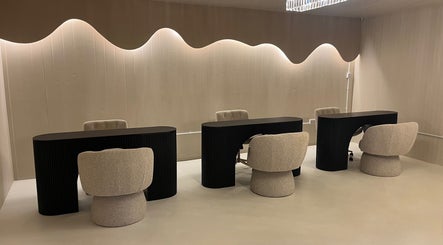 Luxurious seating at Glossed Clinic in Sturry, England, GB, showcasing modern elegance and comfort.