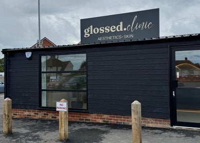 Entrance of Glossed Clinic in Sturry, England, GB displaying the stylish exterior and branding.